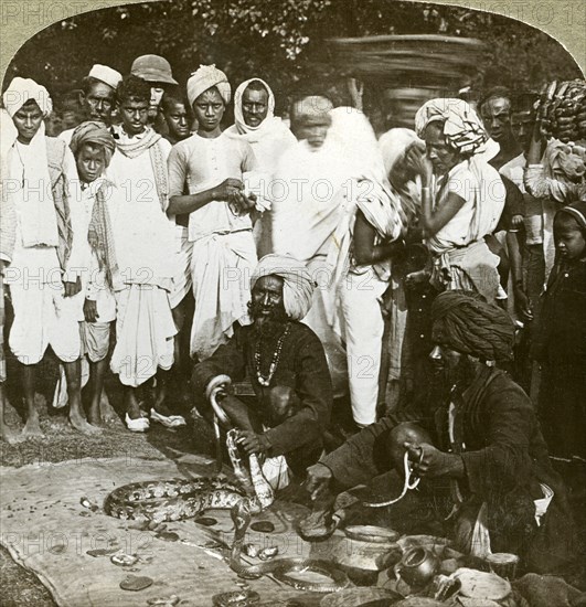 Snake charmer, Calcutta, India, c1900s(?).Artist: Underwood & Underwood