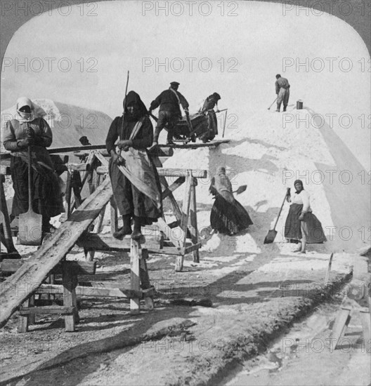 Stacking salt in the great salt fields of Solinen, Black Sea, Russia, 1898.  Artist: Underwood & Underwood