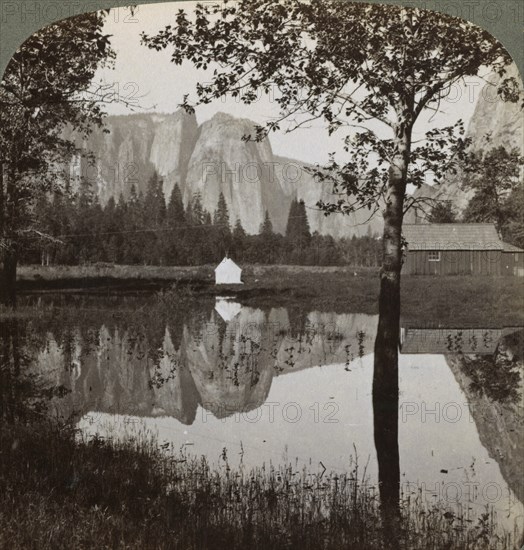 Mirror view of Cathedral Rocks, Yosemite Valley, California, USA, 1902.  Artist: Underwood & Underwood