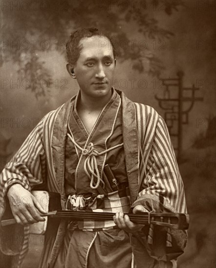 Durward Lely, Scottish opera singer, in Gilbert and Sullivan's 'The Mikado', 1887. Artist: Ernest Barraud