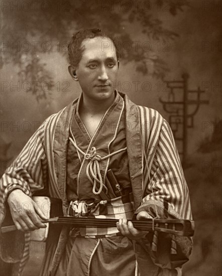 Durward Lely, Scottish opera singer, in Gilbert and Sullivan's 'The Mikado', 1887.  Artist: Ernest Barraud