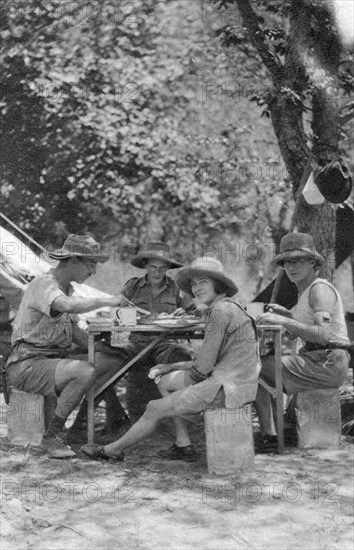 Meal time, Livingstone to Broken Hill, Northern Rhodesia, 1925 (1927).  Artist: Thomas A Glover