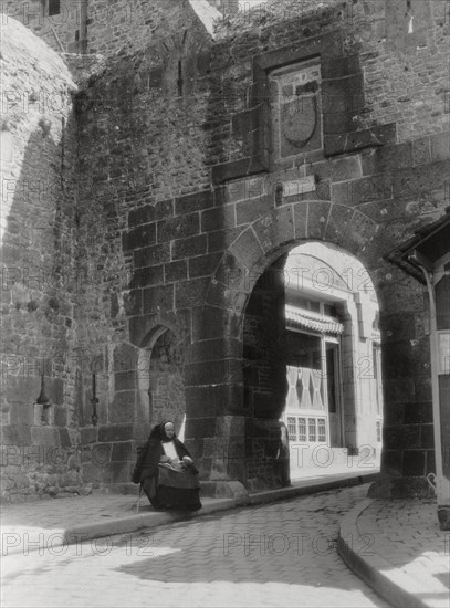 Gateway and entrance to the only street of Mont St Michel, Normandy, France, 20th century. Artist: Unknown