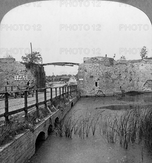 14th century ramparts and Lille Gate, Ypres, Belgium, World War I, c1914-c1918.  Artist: Realistic Travels Publishers