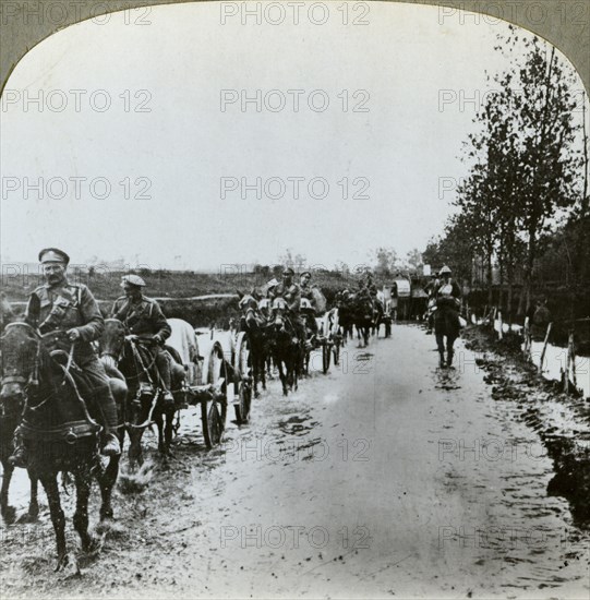 Artillery making their way through mud to Gommecourt, France, World War I, c1914-c1918. Artist: Realistic Travels Publishers