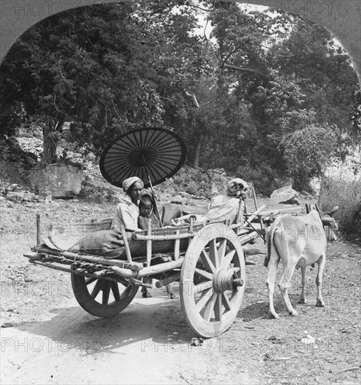 Family journeying through the jungle near Mingun, Burma, 1908. Artist: Stereo Travel Co