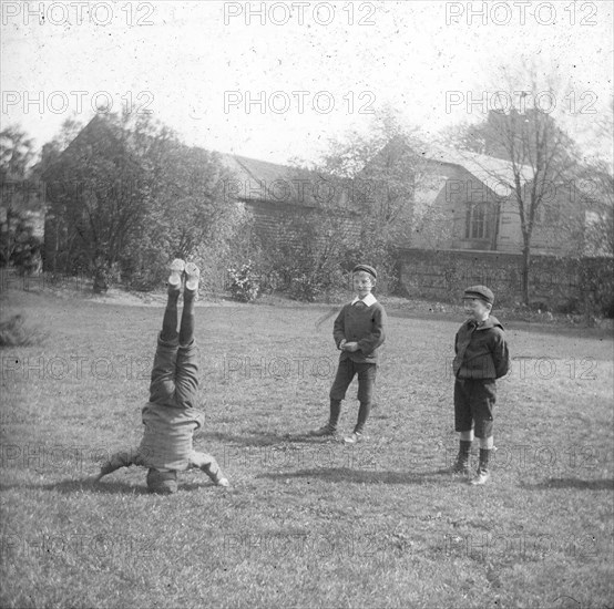 Boys playing, early 20th century(?). Artist: Unknown