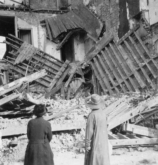 House destroyed by a bomb, Armentières, France, World War I, c1914-c1918. Artist: Nightingale & Co