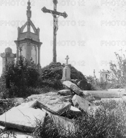 Damaged graves, old communal cemetery, Ypres, Belgium, World War I, c1914-c1918. Artist: Nightingale & Co