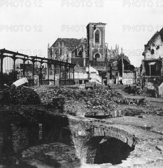 Damaged exterior of the Church of St Vaast, Armentières, France, World War I, c1914-c1918 Artist: Nightingale & Co