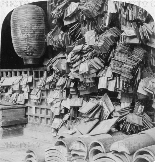 A bundle of buddhist prayers, China, 1896.  Artist: Underwood & Underwood