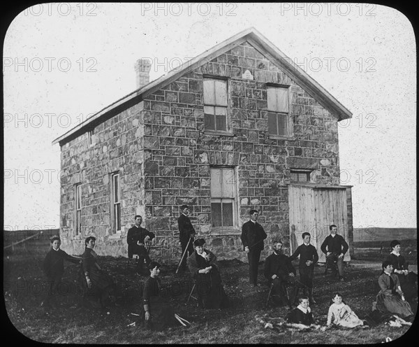'A settler's abode', Canada(?), late 19th century(?). Artist: George Philip & Son Ltd