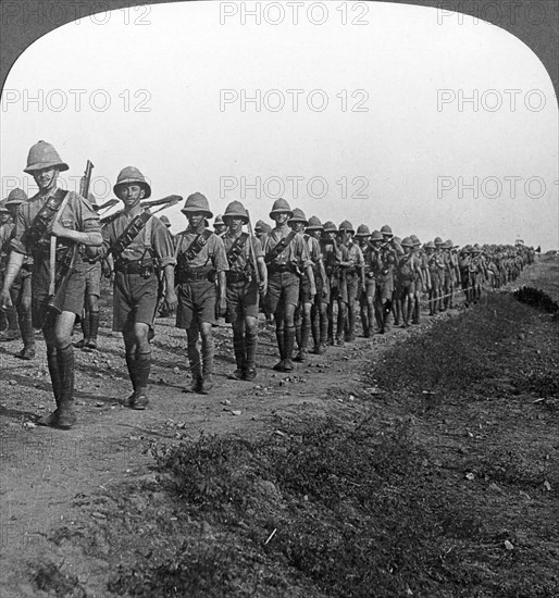 'On the long march through torrid heat to Baghdad', World War I, c1914-c1917. Artist: Realistic Travels Publishers