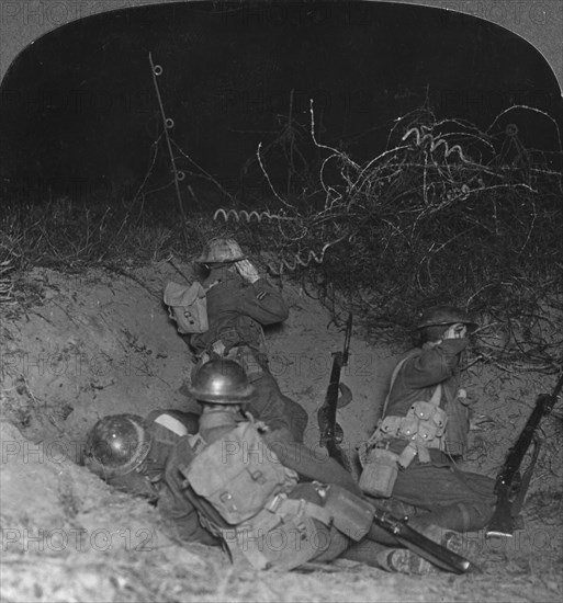 Listening post in a shell hole in No Man's Land, near Lagnicourt, France, World War I, c1914-c1918. Artist: Realistic Travels Publishers