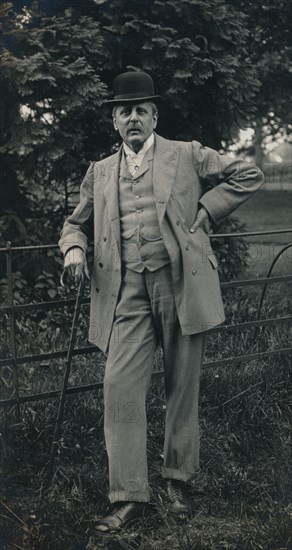 A gentleman wearing a suit and bowler hat c1910. Artist: Unknown