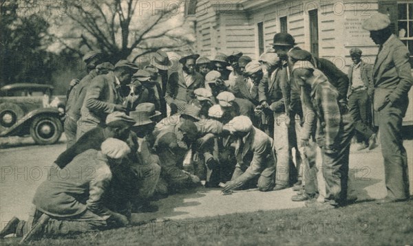 Black Caddies Playing Craps' c1920s. Artist: Unknown