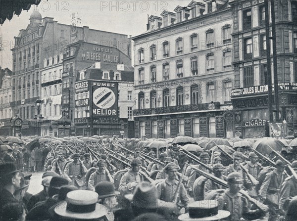 German Infantry entering Brussels in the rain, 1914. Artist: Unknown