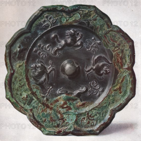 'Bronze Mirror: T'Ang Dynasty', (618-907). Artist: Unknown.