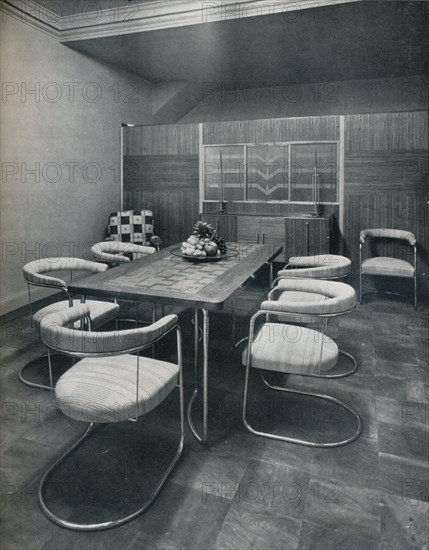 'A dining-room suite, with table and chairs of steel tube. By Practical Equipment Ltd., of London', Artist: Unknown.