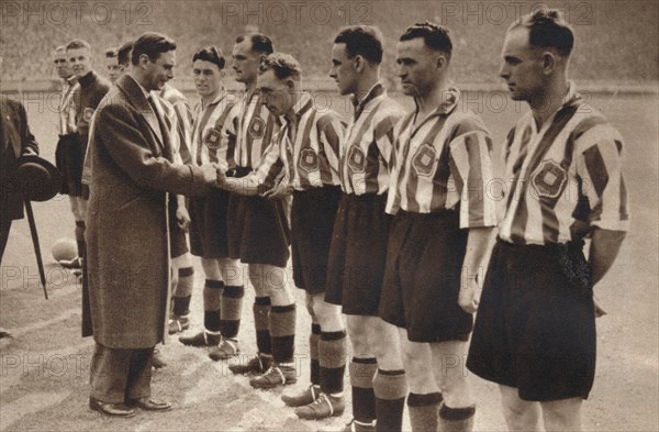 'King George VI and Queen Elizabeth attend the Association Football cup final ', 1937. Artist: Unknown.