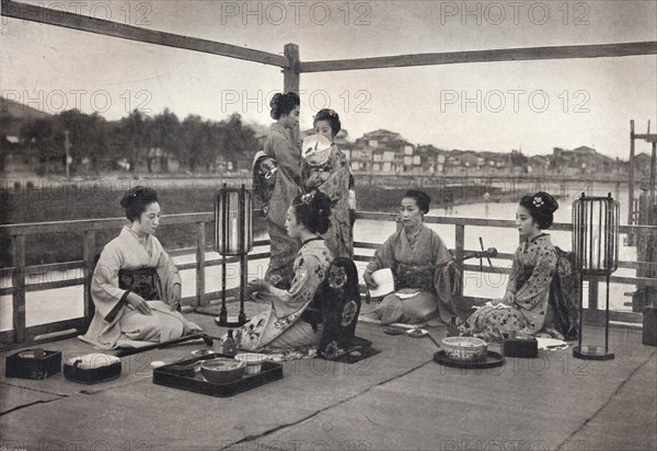 'A Japanese Meal', c1903. Artist: David Stevenson & Co.