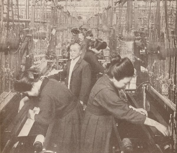 The busy interior of a flourishing silk factory in Japan, 1907. Artist: Unknown.