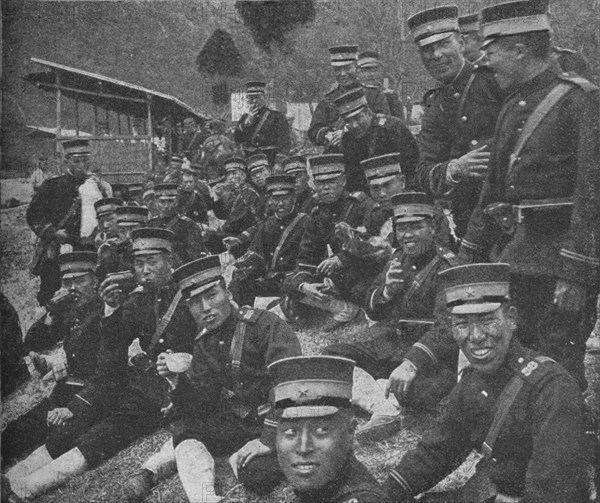 Japanese soldiers on the way to the front: the noonday meal of tea and rice, 1904-1905 (1907). Artist: Unknown.