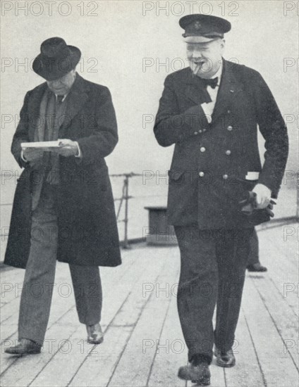 'Churchill, jubilant, aboard H.M.S. Prince of Wales with Lord Beaverbrook, about to say farewell t