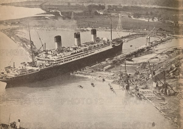 'The White Star Liner Majestic entering the world's largest graving dock at Southampton', c1934, (19 Artist: Unknown.