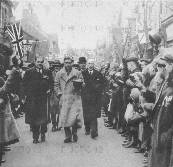 The Prince of Wales greeted by the people of Porth, Glamorgan, during a visit to Wales, 1932 (1936). Artist: Unknown.