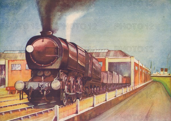 'Latest Austerity Freight Engine, S.R., at Southampton Docks', 1940. Artist: Unknown.