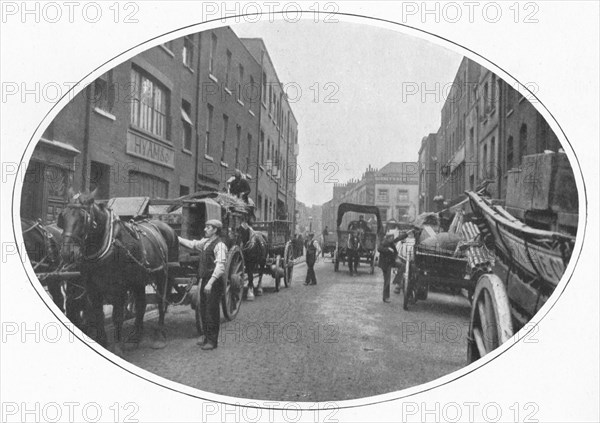 Commencing work, Osborn Street, Whitechapel, London, c1903 (1903). Artist: Unknown.