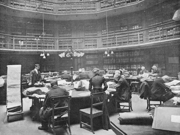 Visitors searching through volumes at the Public Record Office, Chancery Lane, London, 1903. Artist: Unknown.