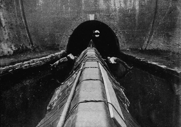 Ready to start 'legging' a canal boat, London, c1890 (1903). Artist: Unknown.