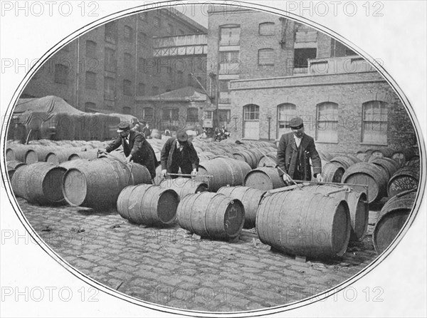 Gauging wine casks at London Docks, c1900 (1901). Artist: Unknown.