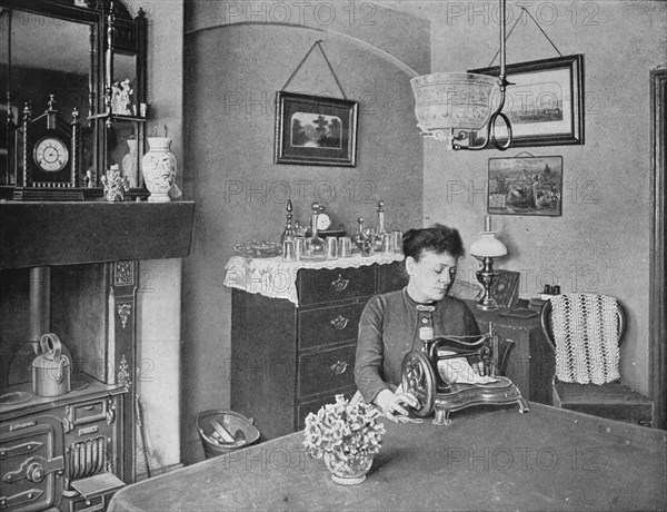 New room in a model dwelling, London, c1900 (1901). Artist: Unknown.