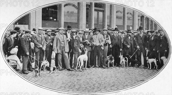 Dog sellers and buyers in the East End, London, c1900 (1901). Artist: Unknown.