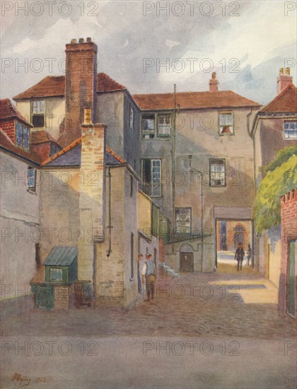 'The Swan Yard, Reigate', 1912, (1914). Artist: James S Ogilvy.