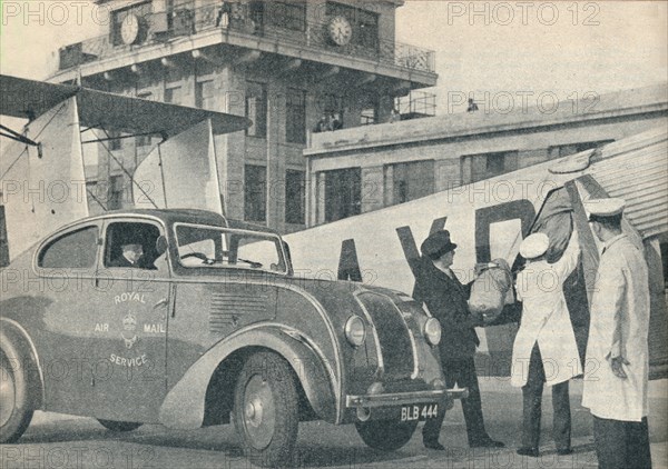 Loading mails on board an Imperial Airways liner at Croydon Airport, c1936  (c1937). Artist: GPO.