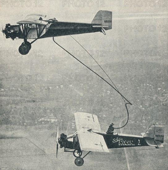 The 'St Louis Robin' refuelling, c1929 (c1937). Artist: Unknown.