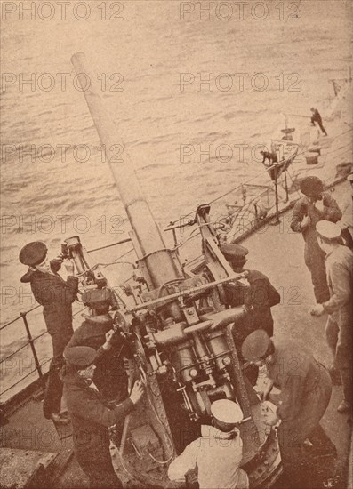 An anti-aircraft gun in action on a British battleship, c1917 (1919). Artist: Unknown.