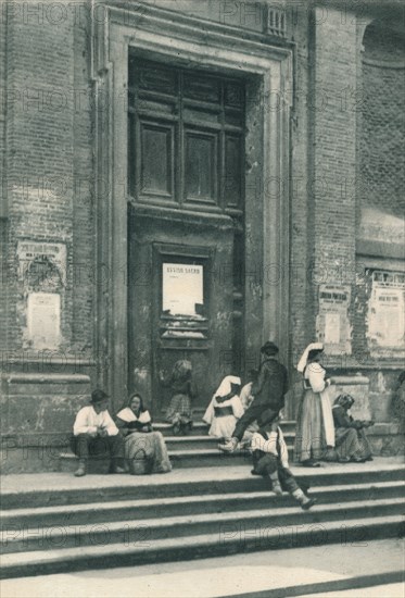 Meeting place of artists' models in front of a church in the Via Babuino, Rome, Italy, 1927. Artist: Eugen Poppel.