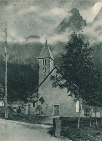 Chapel and Pala Group, San Martino di Castrozza, Dolomites, Italy, 1927. Artist: Eugen Poppel.