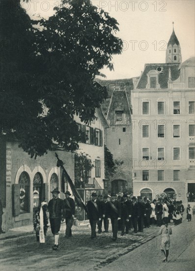 Funeral procession, Merano, South Tyrol, Italy, 1927. Artist: Eugen Poppel.