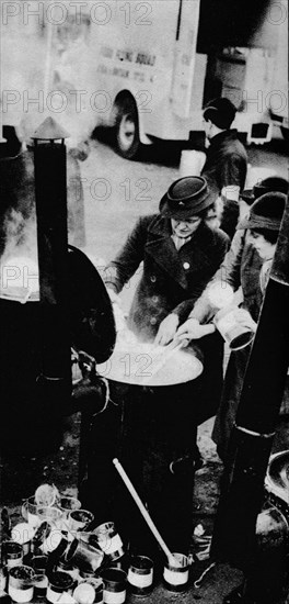 'The W.V.S. Did Many Jobs. Here is a W.V.S. woman managing a field kitchen ', c1941 (1942). Artist: Unknown.