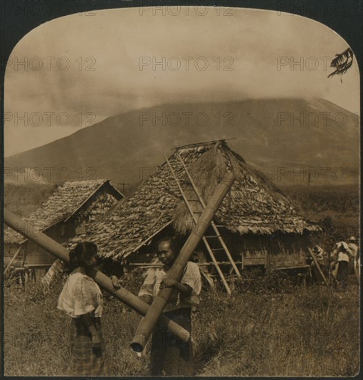 'Native girls with their singular water vessels made of long shafts of Bamboo, Philippine Islands',  Artist: Unknown.