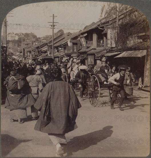'Shops and crowds on Batsumati Street, in the native quarter, Yokohama, Japan', 1904. Artist: Unknown.