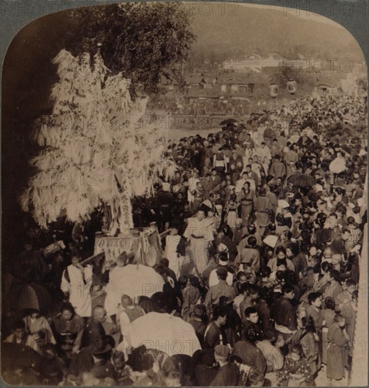 ''Shinto procession carrying sacred objects over bridge to Imperial Museum, Kyoto, Japan', 1904. Artist: Unknown.