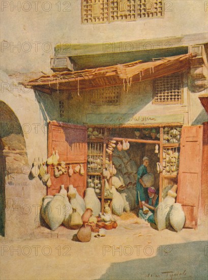 'Pottery Bazaar in a Nile Village', c1905, (1912). Artist: Walter Frederick Roofe Tyndale.