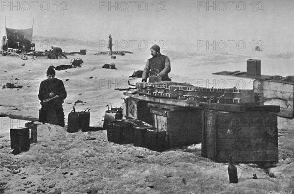 'Cleaning the Accumulators Before Stowing Away. July, 1895', (1897). Artist: Unknown.